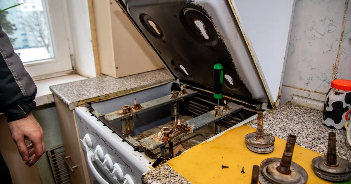 Certified Mechanical technician repairing a stove in Toronto